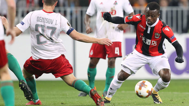 Nice's Ivorian midfielder Jean Michael Seri (R) vies with Lokomotiv Igor Denisov (L) during the UEFA Europa League football match between Nice and Lokomotiv Moscow on February 15, 2018, at the Allianz Riviera stadium in Nice, southeastern France. / AFP PHOTO / VALERY HACHE