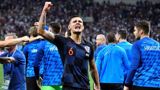 Croatia's defender Dejan Lovren (C) celebrates his team's victory at the end of the Russia 2018 World Cup semi-final football match between Croatia and England at the Luzhniki Stadium in Moscow on July 11, 2018.