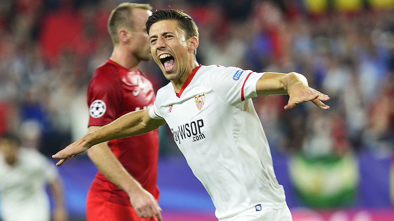 Sevilla's French defender Clement Lenglet celebrates after scoring a goal during the UEFA Champions League group E football match between Sevilla and Spartak Moscow at Sanchez Pizjuan Stadium in Sevilla on November 1, 2017. / AFP PHOTO / CRISTINA QUICLER