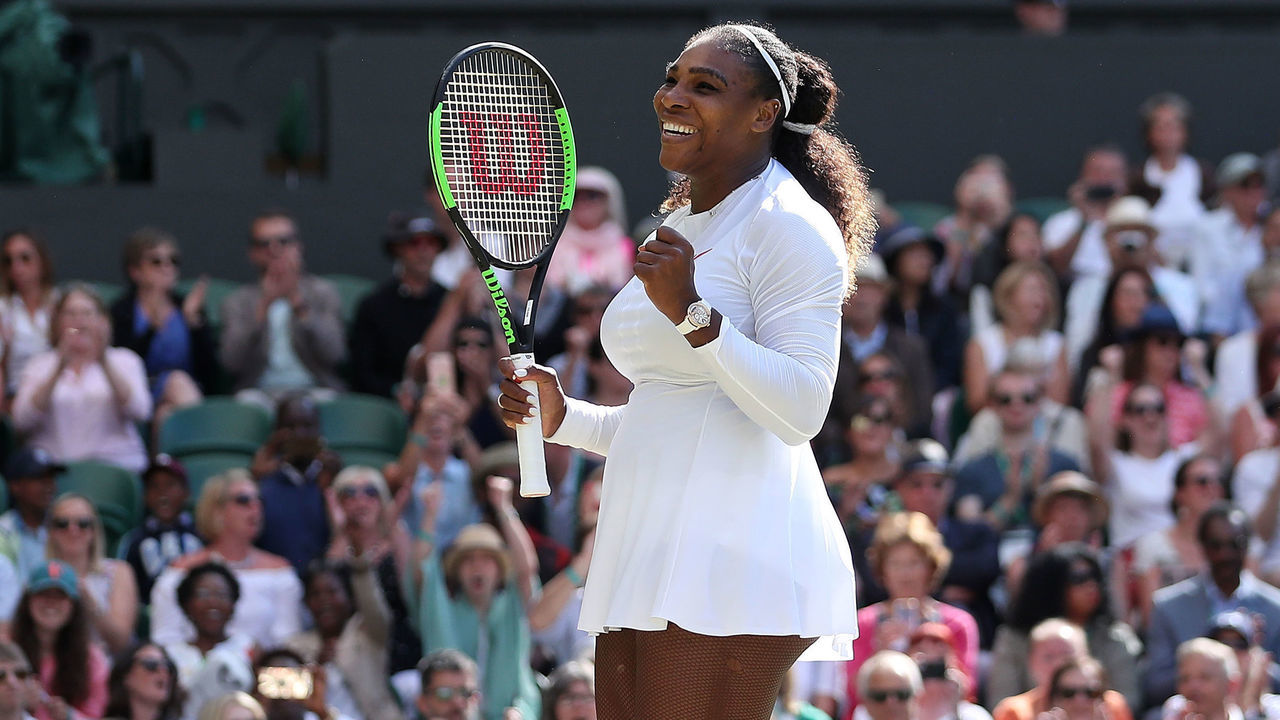 US player Serena Williams celebrates after winning against Italy's Camila Giorgi during their women's singles quarter-final match on the eighth day of the 2018 Wimbledon Championships at The All England Lawn Tennis Club in Wimbledon, southwest London, on July 10, 2018. - Williams won the match 3-6, 6-3, 6-4.