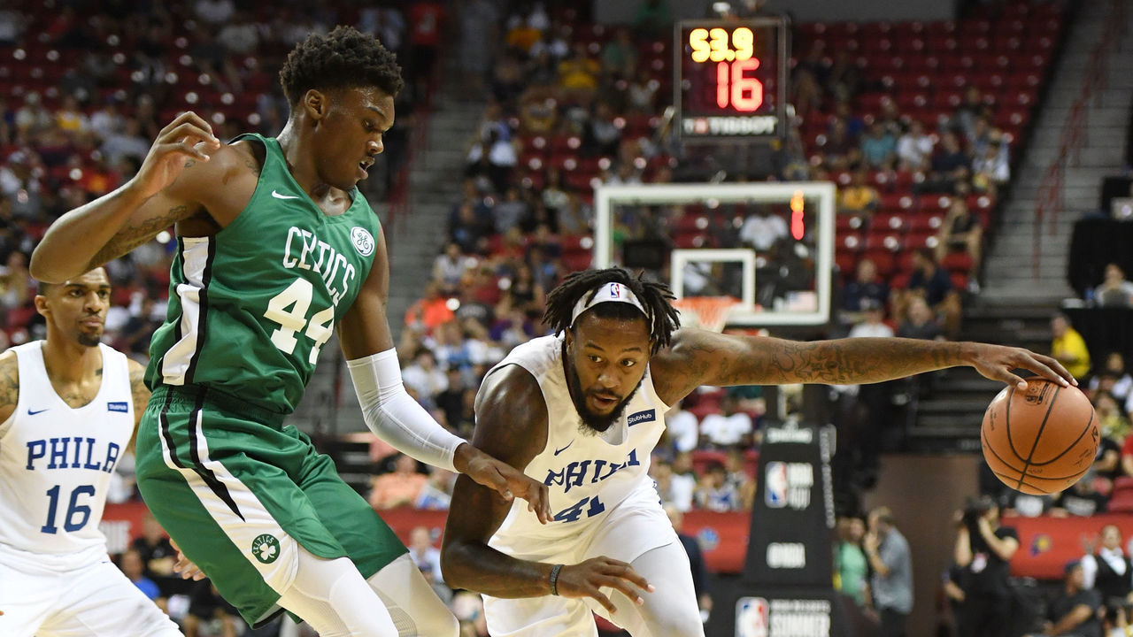 LAS VEGAS, NV - JULY 06: Isaiah Miles #41 of the Philadelphia 76ers drives against Robert Williams III #44 of the Boston Celtics during the 2018 NBA Summer League at the Thomas & Mack Center on July 6, 2018 in Las Vegas, Nevada. The Celtics defeated the 76ers 69-63.