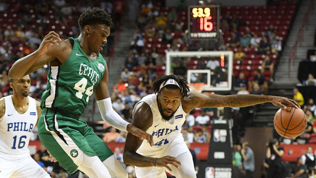 LAS VEGAS, NV - JULY 06: Isaiah Miles #41 of the Philadelphia 76ers drives against Robert Williams III #44 of the Boston Celtics during the 2018 NBA Summer League at the Thomas & Mack Center on July 6, 2018 in Las Vegas, Nevada. The Celtics defeated the 76ers 69-63.
