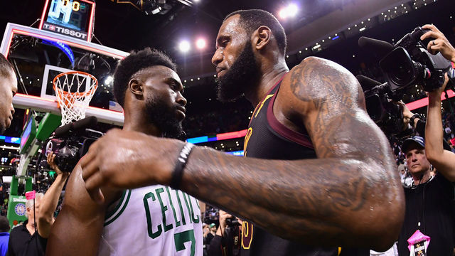 BOSTON, MA - MAY 27: LeBron James #23 of the Cleveland Cavaliers talks with Jaylen Brown #7 of the Boston Celtics after the Cleveland Cavaliers defeated the Boston Celtics 87-79 in Game Seven of the 2018 NBA Eastern Conference Finals to advance to the 2018 NBA Finals at TD Garden on May 27, 2018 in Boston, Massachusetts.