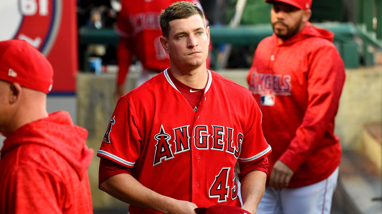 ANAHEIM, CA - APRIL 28: Garrett Richards #43 Los Angeles Angels of Anaheim leaves the dugout after he was pulled by manager Mike Scioscia #14 after allowing eight runs by the second inning of the game against the New York Yankees at Angel Stadium on April 28, 2018 in Anaheim, California.
