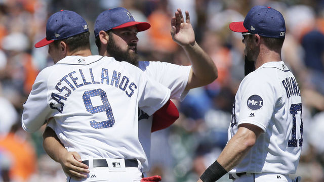 DETROIT, MI - JULY 4: Pitcher Michael Fulmer #32 of the Detroit Tigers celebrates with Nicholas Castellanos #9 of the Detroit Tigers and Andrew Romine #17 of the Detroit Tigers after a 5-3 win over the San Francisco Gians at Comerica Park on July 4, 2017 in Detroit, Michigan. Fuller recorded his 8th win in the game.