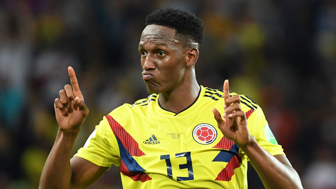TOPSHOT - Colombia's defender Yerry Mina celebrates after scoring the equalizer during the Russia 2018 World Cup round of 16 football match between Colombia and England at the Spartak Stadium in Moscow on July 3, 2018.