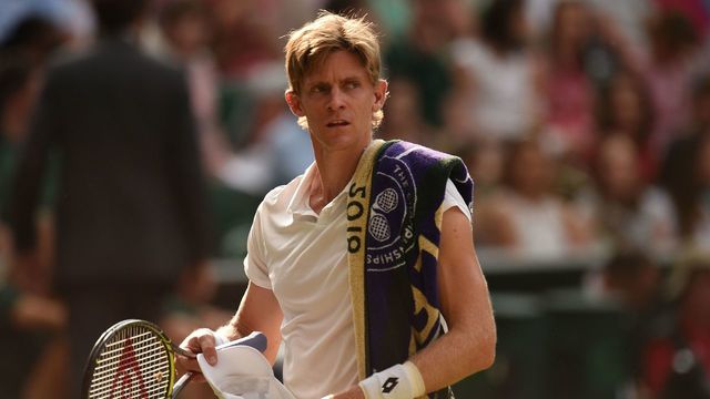 TOPSHOT - South Africa's Kevin Anderson reacts against US player John Isner during the final set tie-break of their men's singles semi-final match on the eleventh day of the 2018 Wimbledon Championships at The All England Lawn Tennis Club in Wimbledon, southwest London, on July 13, 2018.