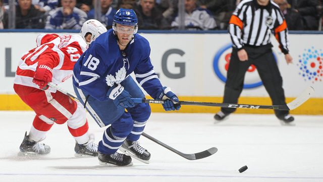 TORONTO, ON - MARCH 24: Andreas Johnsson #18 of the Toronto Maple Leafs skates with the puck against the Detroit Red Wings during an NHL game at the Air Canada Centre on March 24, 2018 in Toronto, Ontario, Canada. The Maple Leafs defeated the Red Wings 4-3. *** Local Caption *** Andreas Johnsson
