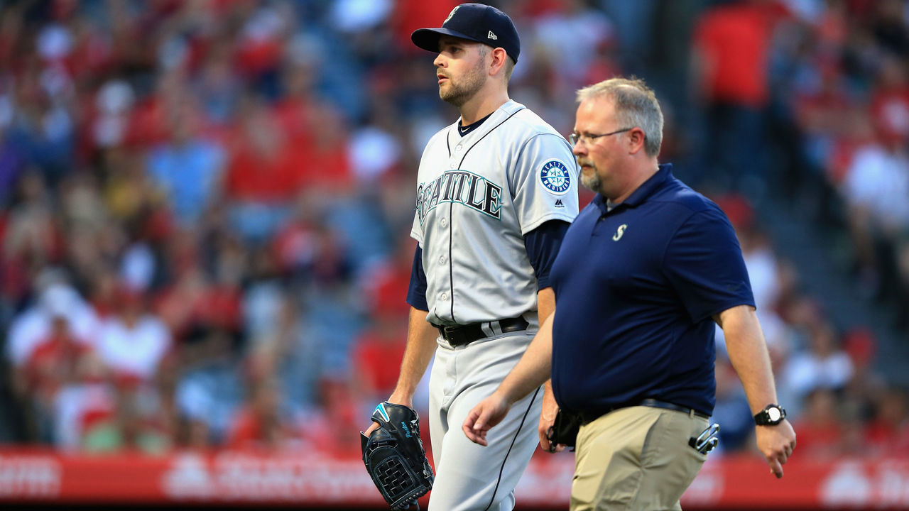 ANAHEIM, CA - JULY 12: James Paxton #65 of the Seattle Mariners leaves the game after allowing two homeruns during the first inning of a game against the Los Angeles Angels of Anaheim at Angel Stadium on July 12, 2018 in Anaheim, California.