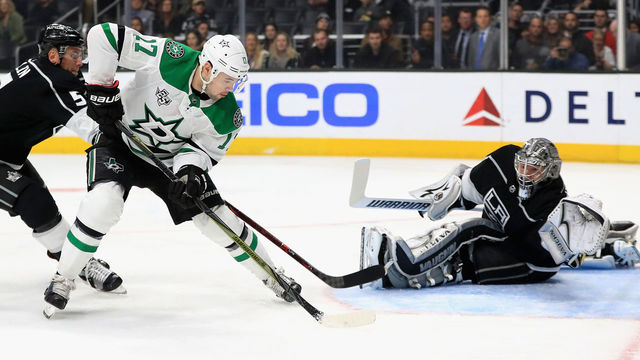 LOS ANGELES, CA - APRIL 07: Devin Shore #17 of the Dallas Stars scores a goal as Christian Folin #5 and Jonathan Quick #32 of the Los Angeles Kings defend during the first period of a game at Staples Center on April 7, 2018 in Los Angeles, California.