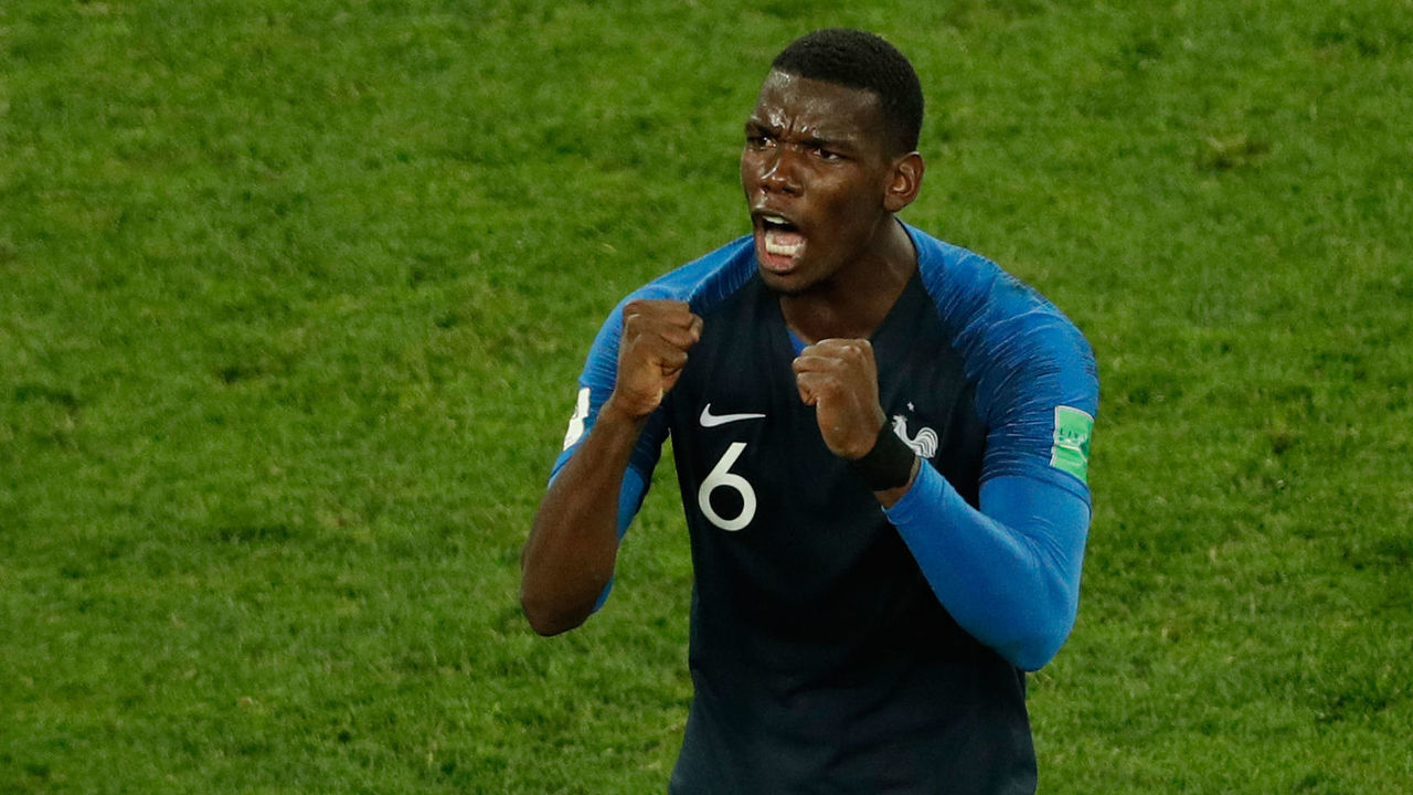 TOPSHOT - France's midfielder Paul Pogba celebrates at the end of the Russia 2018 World Cup semi-final football match between France and Belgium at the Saint Petersburg Stadium in Saint Petersburg on July 10, 2018.
