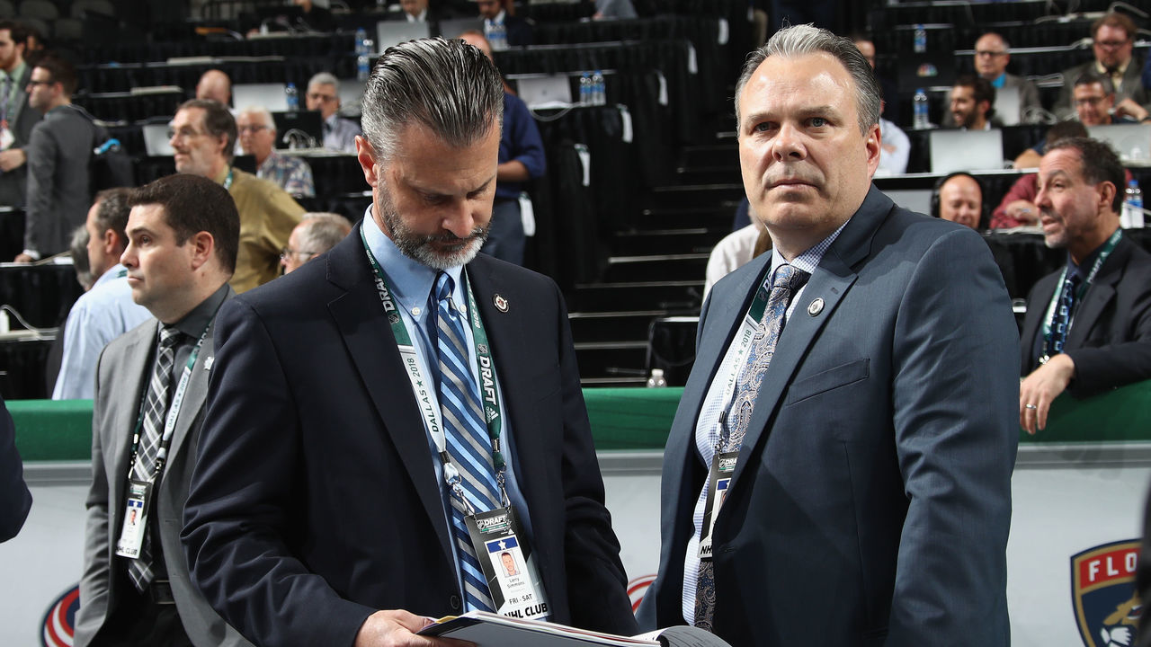 DALLAS, TX - JUNE 22: (l-r) Larry Simons and Kevin Cheveldayoff of the Winnipeg Jets attend the first round during the first round Airlines Center on June 22, 2018 in Dallas, Texas.