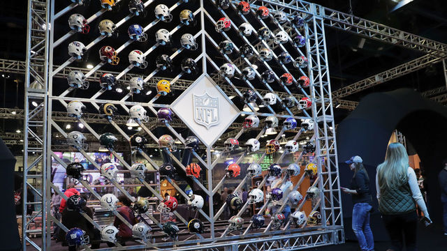 HOUSTON, TX - JANUARY 29: A wall of helmets at the NFL Experience on January 29, 2017 in Houston, Texas.
