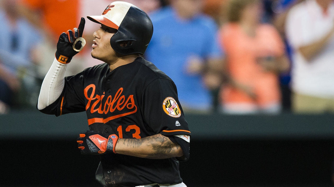 BALTIMORE, MD - AUGUST 04: Manny Machado #13 of the Baltimore Orioles celebrates after hitting a solo home run in the third inning during a game against the Detroit Tigers at Oriole Park at Camden Yards on August 4, 2017 in Baltimore, Maryland.