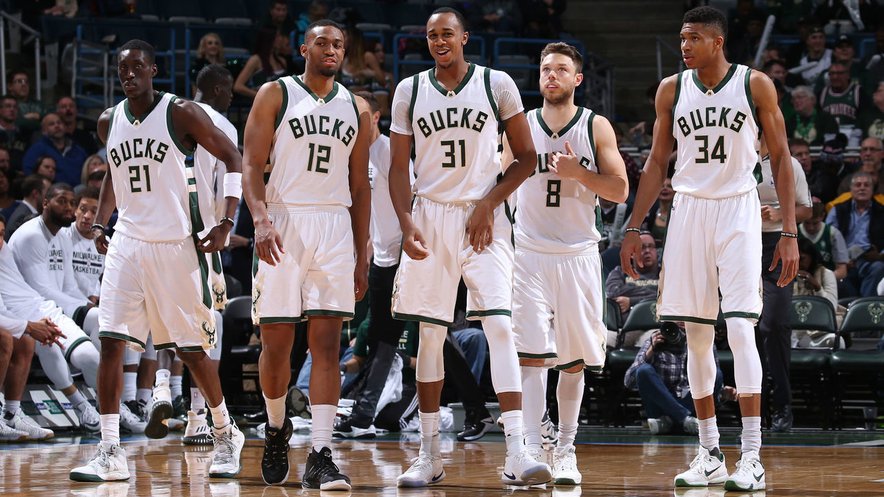 Milwaukee, WI - NOVEMBER 21: Tony Snell #21, Jabari Parker #12, John Henson #31, Matthew Dellavedova #8 and Giannis Antetokounmpo #34 of the Milwaukee Bucks stand on the court during the game against the Orlando Magic on November 21, 2016 at the BMO Harris Bradley Center in Milwaukee, Wisconsin. Mandatory Copyright Notice: Copyright 2016 NBAE