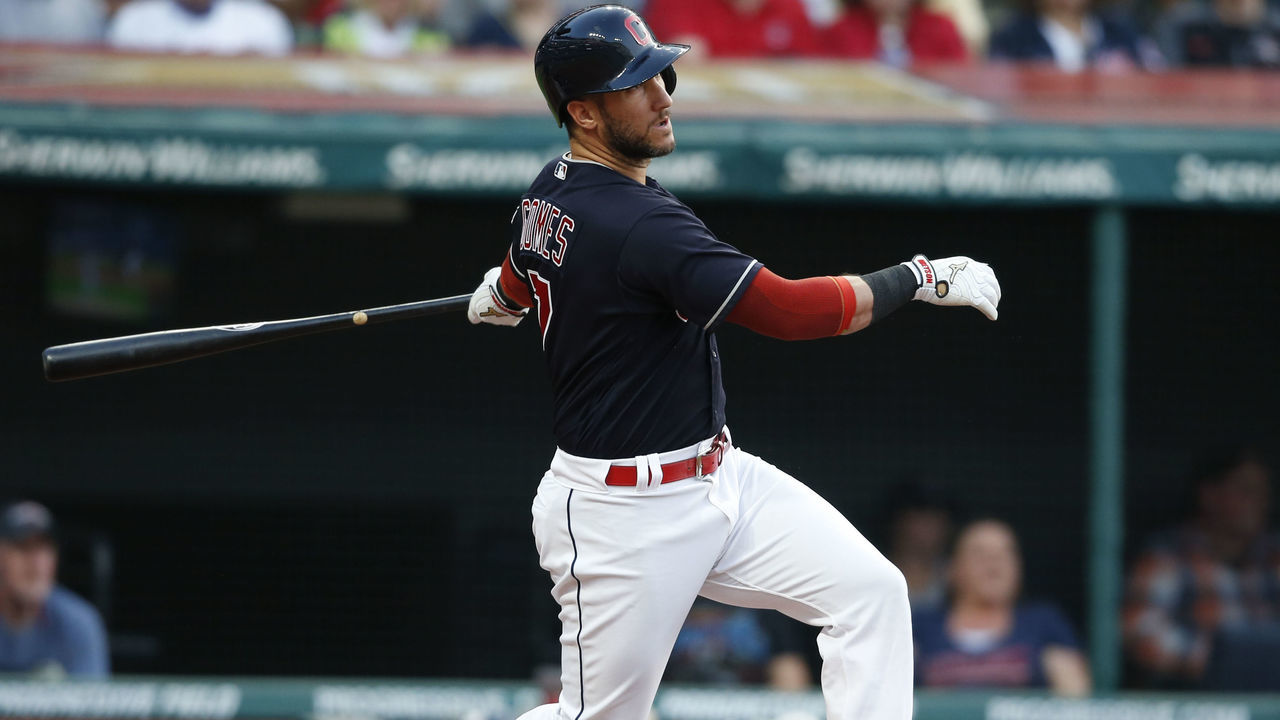 CLEVELAND, OH - JULY 11: Yan Gomes #7 of the Cleveland Indians hits a two run single off starting pitcher Tyler Mahle #30 of the Cincinnati Reds during the third inning at Progressive Field on July 11, 2018 in Cleveland, Ohio.The Indians defeated the Reds 19-4.