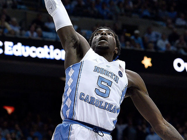 CHAPEL HILL, NC - JANUARY 09: Jalek Felton #5 of the North Carolina Tar Heels dunks against the Boston College Eagles during their game at the Dean Smith Center on January 9, 2018 in Chapel Hill, North Carolina. North Carolina won 96-66.