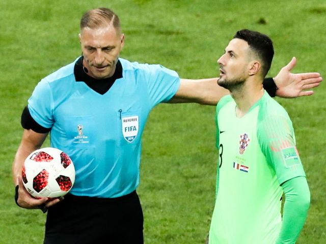MOSCOW, RUSSIA - JULY 15, 2018: Referee Nestor Pitana (L) and Croatia's goalkeeper Danijel Subasic in the 2018 FIFA World Cup Final match between France and Croatia at Luzhniki Stadium. Stanislav Krasilnikov/TASS