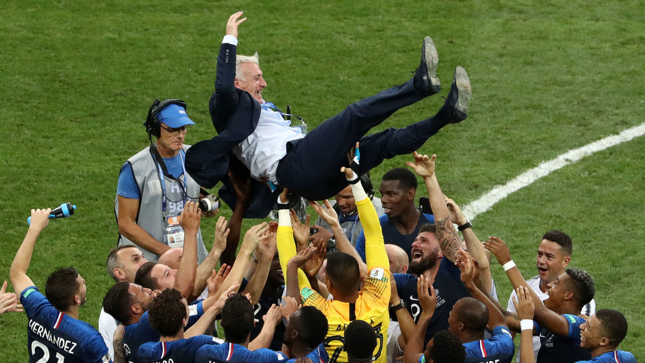MOSCOW, RUSSIA - JULY 15: France players celebrate with Didier Deschamps, Manager of France following their sides victory in the 2018 FIFA World Cup Final between France and Croatia at Luzhniki Stadium on July 15, 2018 in Moscow, Russia.