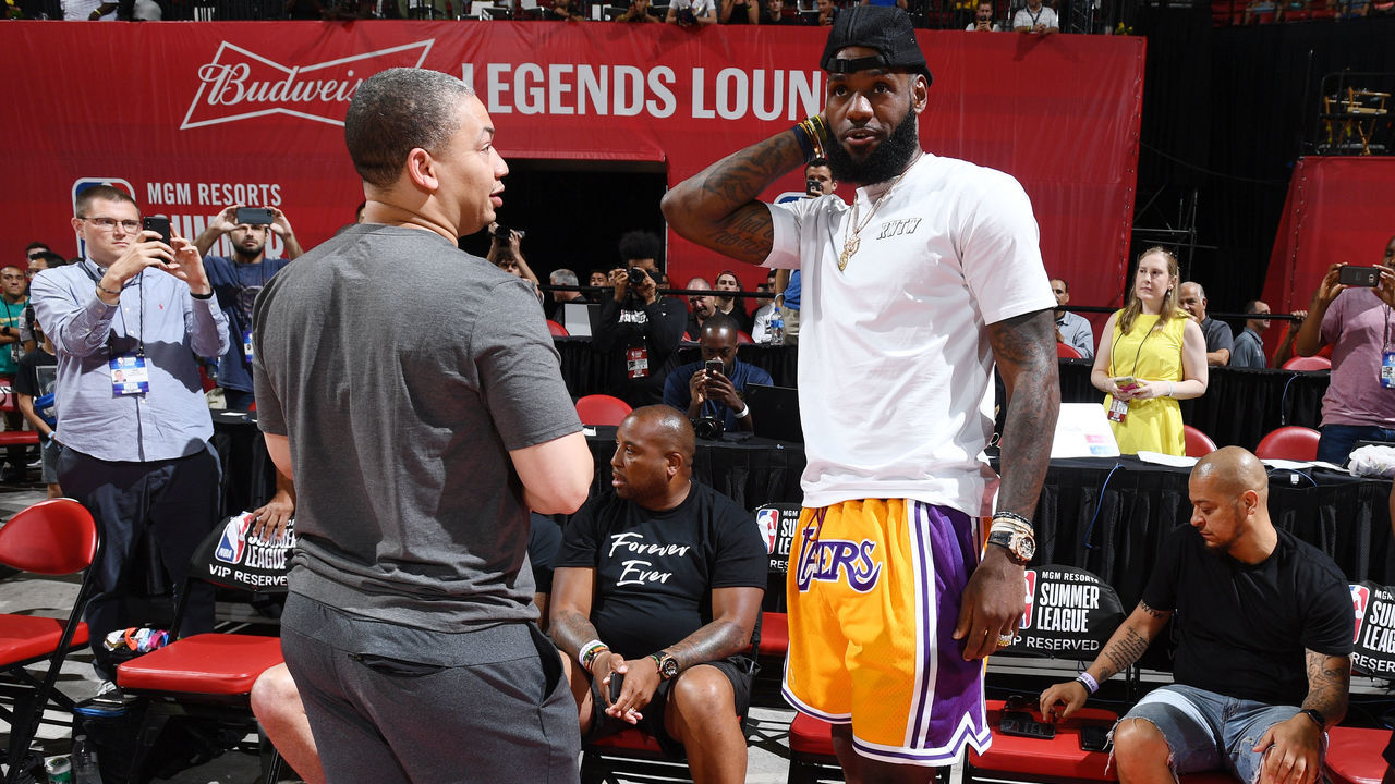 LAS VEGAS, NV - JULY 15: Head Coach Tyronn Lue of the Cleveland Cavaliers speaks with LeBron James #23 of the Los Angeles Lakers during the game against the Detroit Pistons during the 2018 Las Vegas Summer League on July 15, 2018 at the Thomas & Mack Center in Las Vegas, Nevada. NOTE TO USER: User expressly acknowledges and agrees that, by downloading and/or using this photograph, user is consenting to the terms and conditions of the Getty Images License Agreement. Mandatory Copyright Notice: Copyright 2018 NBAE