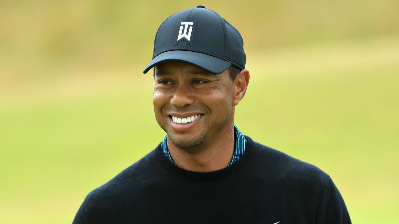 CARNOUSTIE, SCOTLAND - JULY 16: Tiger Woods of United States smiles during previews ahead of the 147th Open Championship at Carnoustie Golf Club on July 16, 2018 in Carnoustie, Scotland.