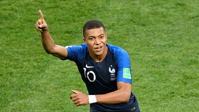 France's forward Kylian Mbappe celebrates after scoring a goal during the Russia 2018 World Cup final football match between France and Croatia at the Luzhniki Stadium in Moscow on July 15, 2018.