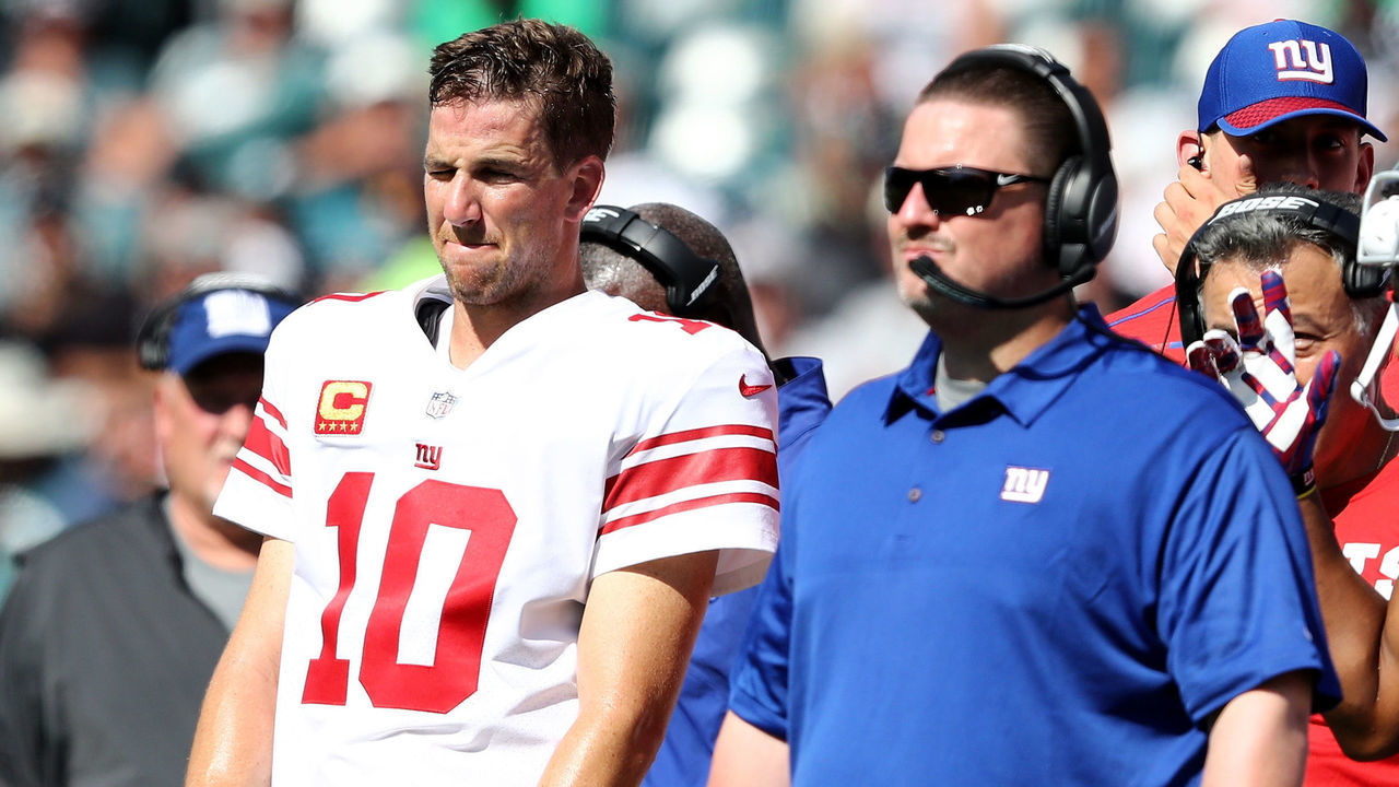 PHILADELPHIA, PA - SEPTEMBER 24: Eli Manning #10 of the New York Giants and head coach Ben McAdoo wait for the review on a touchdown scored in the second quarter by the New York Giants on September 24, 2017 at Lincoln Financial Field in Philadelphia, Pennsylvania.The touchdown was called back and the New York Giants did not score on the possession against the Philadelphia Eagles.