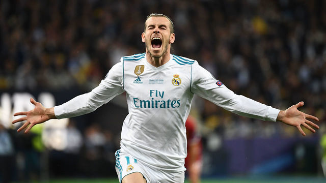 TOPSHOT - Real Madrid's Welsh forward Gareth Bale celebrates after scoring his team's second goal during the UEFA Champions League final football match between Liverpool and Real Madrid at the Olympic Stadium in Kiev, Ukraine, on May 26, 2018.