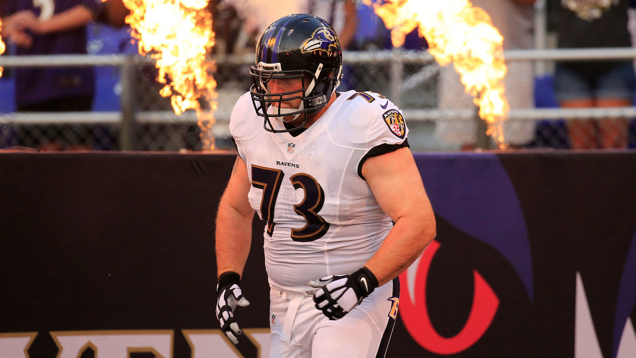 BALTIMORE, MD - AUGUST 07: Guard Marshal Yanda #73 of the Baltimore Ravens is introduced before the start of an NFL pre-season game against the San Francisco 49ers at M&T Bank Stadium on August 7, 2014 in Baltimore, Maryland.