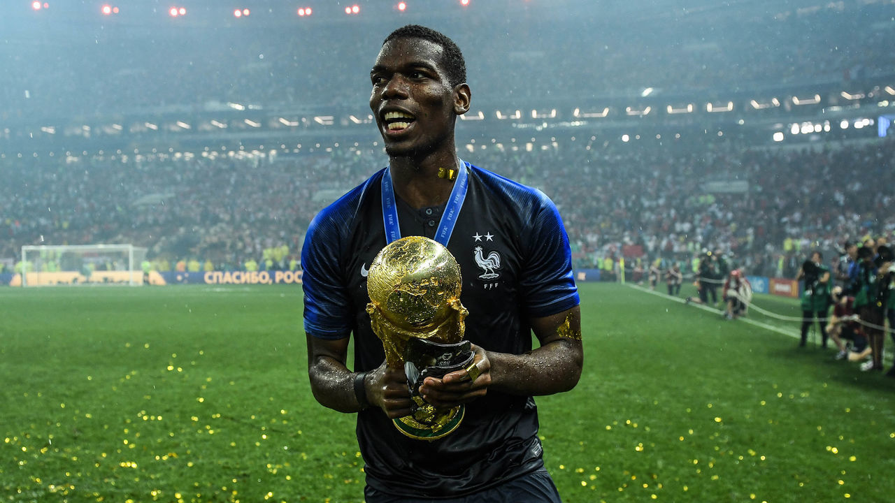 MOSCOW, RUSSIA - JULY 15: Paul Pogba of France celebrates with the World Cup Trophy following his side victory in the 2018 FIFA World Cup Russia Final between France and Croatia at Luzhniki Stadium on July 15, 2018 in Moscow, Russia.