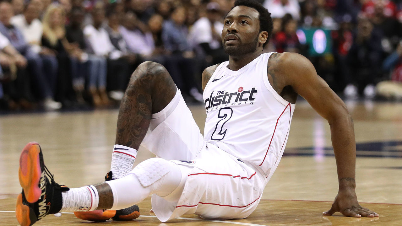 WASHINGTON, DC - APRIL 27: John Wall #2 of the Washington Wizards looks on against the Toronto Raptors in the second half during Game Six of Round One of the 2018 NBA Playoffs at Capital One Arena on April 27, 2018 in Washington, DC.