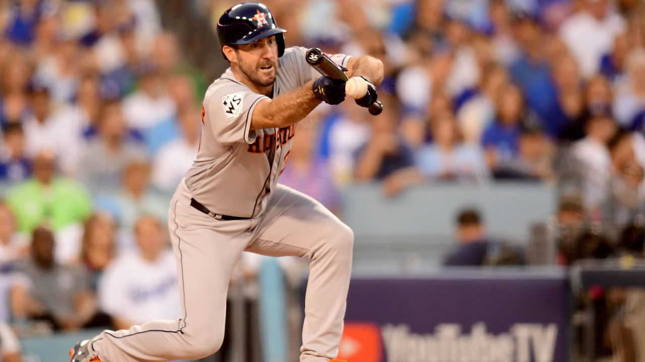 LOS ANGELES, CA - OCTOBER 25: Justin Verlander #35 of the Houston Astros bunts during the third inning against the Los Angeles Dodgers in game two of the 2017 World Series at Dodger Stadium on October 25, 2017 in Los Angeles, California.
