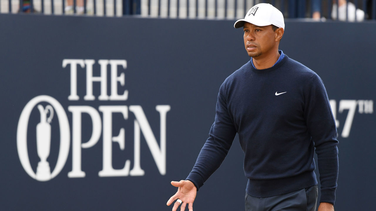 CARNOUSTIE, SCOTLAND - JULY 16: Tiger Woods of the United States walks onto the first tee during previews to the 147th Open Championship at Carnoustie Golf Club on July 16, 2018 in Carnoustie, Scotland.