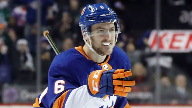 NEW YORK, NY - MARCH 18: Ryan Pulock #6 of the New York Islanders celebrates a second period goal by Josh Bailey #12 against the Carolina Hurricanes at the Barclays Center on March 18, 2018 in the Brooklyn borough of New York City.