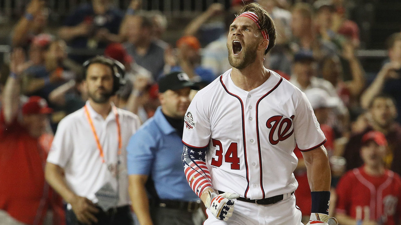 WASHINGTON, DC - JULY 16: Bryce Harper of the Washington Nationals and National League celebrates in the finals after tying Kyle Schwarber of the Chicago Cubs and National League during the T-Mobile Home Run Derby at Nationals Park on July 16, 2018 in Washington, DC.