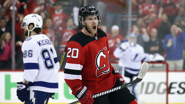 NEWARK, NJ - APRIL 16: Blake Coleman #20 of the New Jersey Devils celebrates his empty net goal at 19:02 of the third period against the Tampa Bay Lightning in Game Three of the Eastern Conference First Round during the 2018 NHL Stanley Cup Playoffs at the Prudential Center on April 16, 2018 in Newark, New Jersey. The Devils defeated the Lightning 5-2.