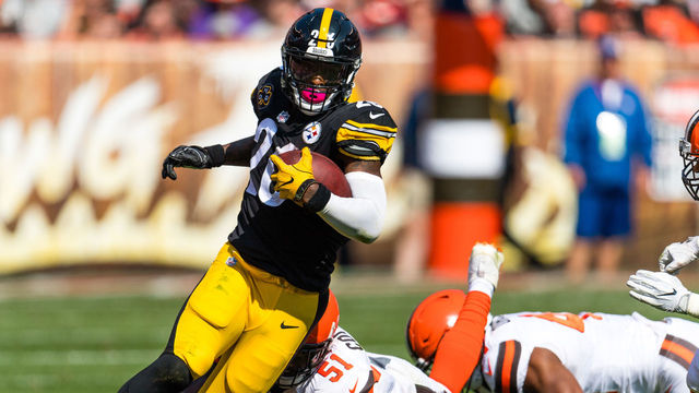 CLEVELAND, OH - SEPTEMBER 10: Running back Le'Veon Bell #26 of the Pittsburgh Steelers jumps over outside linebacker Jamie Collins #51 of the Cleveland Browns during the second half at FirstEnergy Stadium on September 10, 2017 in Cleveland, Ohio. The Steelers defeated the Browns 21-18.