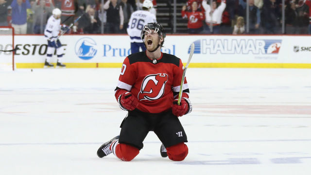 NEWARK, NJ - APRIL 16: Blake Coleman #20 of the New Jersey Devils celebrates his empty net goal at 19:02 of the third period against the Tampa Bay Lightning in Game Three of the Eastern Conference First Round during the 2018 NHL Stanley Cup Playoffs at the Prudential Center on April 16, 2018 in Newark, New Jersey. The Devils defeated the Lightning 5-2.