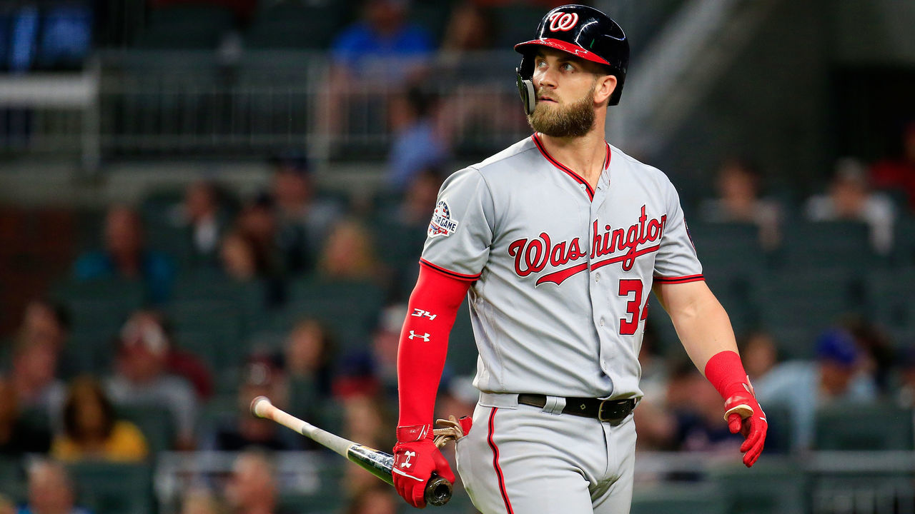 ATLANTA, GA - JUNE 01: Bryce Harper #34 of the Washington Nationals walks back to the dugout after a line out to first during the seventh inning against the Atlanta Braves at SunTrust Park on June 1, 2018 in Atlanta, Georgia.