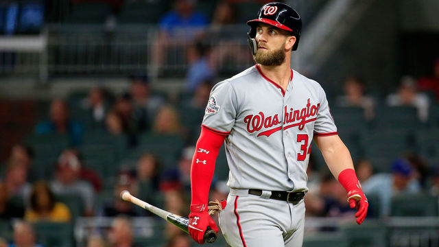 ATLANTA, GA - JUNE 01: Bryce Harper #34 of the Washington Nationals walks back to the dugout after a line out to first during the seventh inning against the Atlanta Braves at SunTrust Park on June 1, 2018 in Atlanta, Georgia.