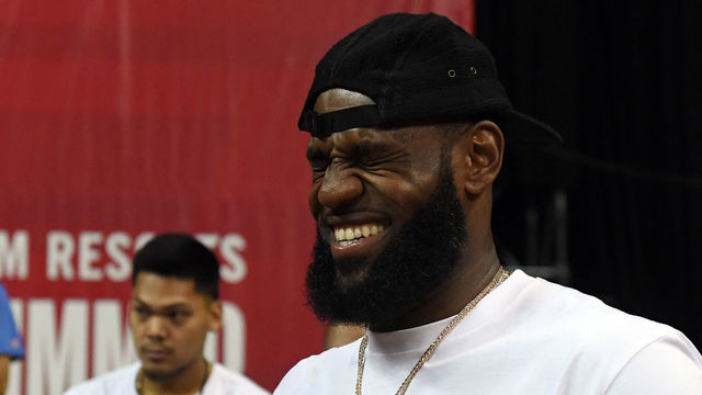 LAS VEGAS, NV - JULY 15: LeBron James of the Los Angeles Lakers laughs as he attends a quarterfinal game of the 2018 NBA Summer League between the Lakers and the Detroit Pistons at the Thomas & Mack Center on July 15, 2018 in Las Vegas, Nevada.