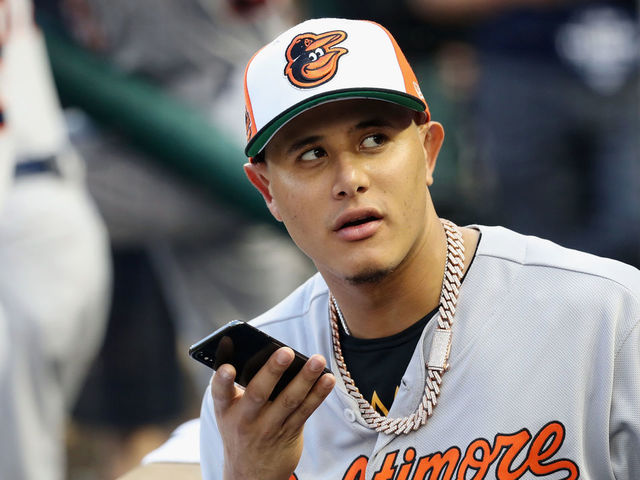 WASHINGTON, DC - JULY 17: Manny Machado #13 of the Baltimore Orioles and the American League speaks on a phone during introductions before the 89th MLB All-Star Game, presented by Mastercard at Nationals Park on July 17, 2018 in Washington, DC.