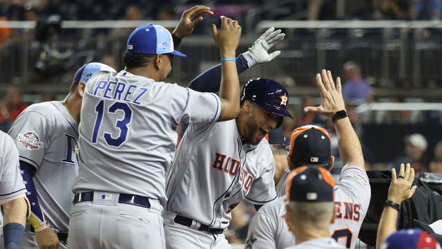 WASHINGTON, DC - JULY 17: George Springer #4 of the Houston Astros and the American League celebrates with teammates after hitting a solo home run in the tenth inning against the National League during the 89th MLB All-Star Game, presented by Mastercard at Nationals Park on July 17, 2018 in Washington, DC.