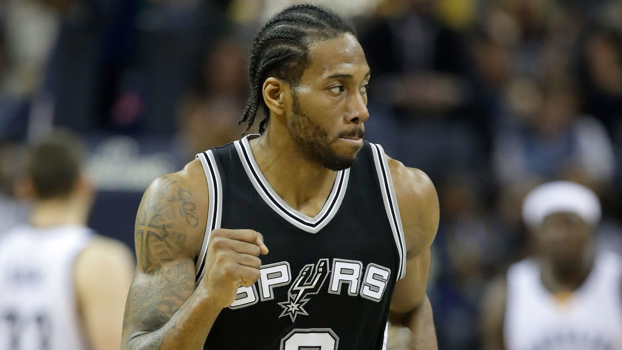 MEMPHIS, TN - APRIL 22: Kawhi Leonard #2 of the San Antonio Spurs pumps his fist after making a three point shot against the Memphis Grizzlies in game four of the Western Conference Quarterfinals during the 2017 NBA Playoffs at FedExForum on April 22, 2017 in Memphis, Tennessee.