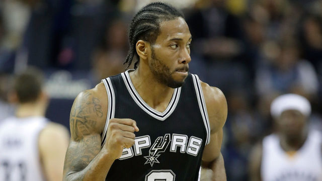 MEMPHIS, TN - APRIL 22: Kawhi Leonard #2 of the San Antonio Spurs pumps his fist after making a three point shot against the Memphis Grizzlies in game four of the Western Conference Quarterfinals during the 2017 NBA Playoffs at FedExForum on April 22, 2017 in Memphis, Tennessee.