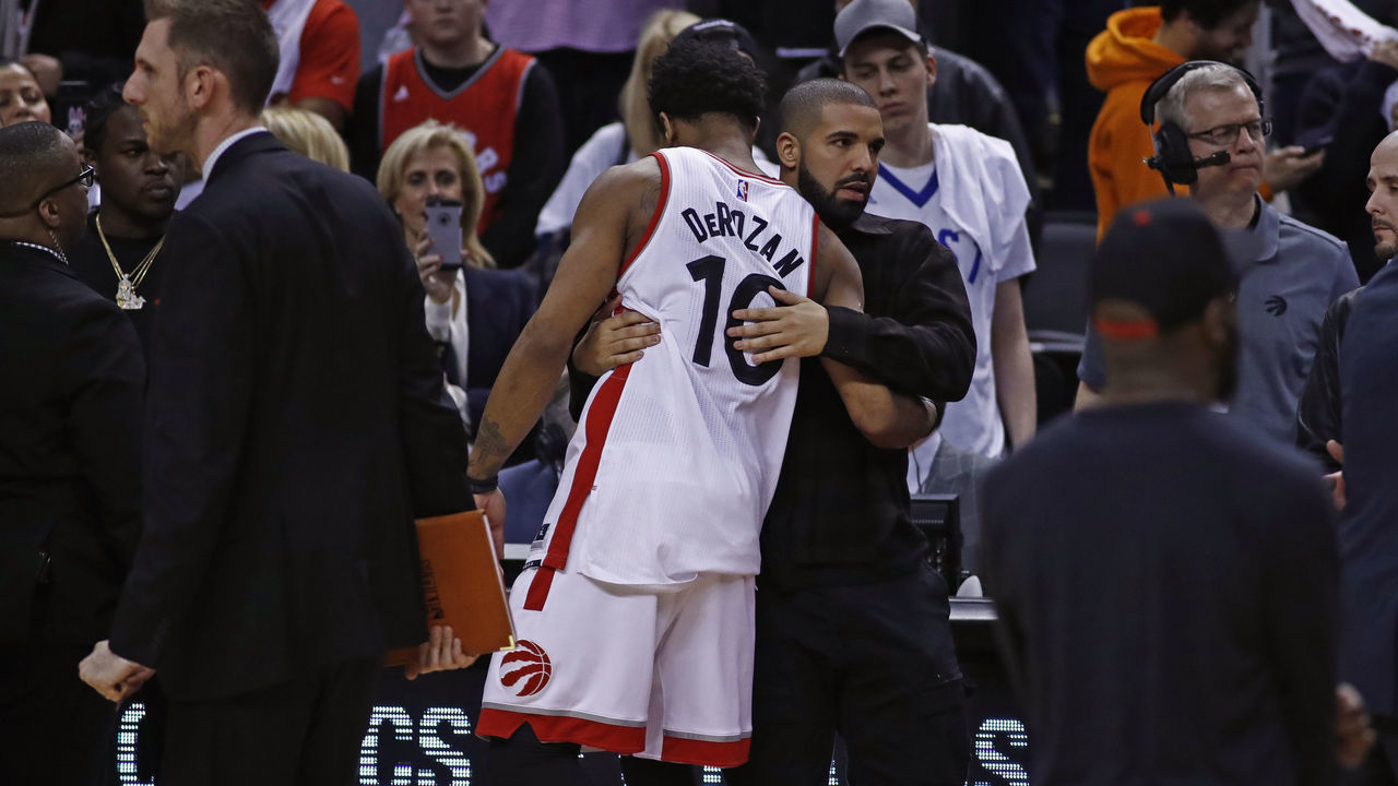TORONTO, CANADA - MAY 7: Rapper, Drake greets DeMar DeRozan #10 of the Toronto Raptors after Game Four of the Eastern Conference Semifinals against the Cleveland Cavaliers during the 2017 NBA Playoffs on May 7, 2017 at the Air Canada Centre in Toronto, Ontario, Canada. Mandatory Copyright Notice: Copyright 2017 NBAE
