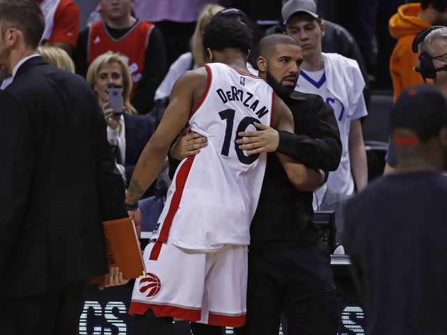 TORONTO, CANADA - MAY 7: Rapper, Drake greets DeMar DeRozan #10 of the Toronto Raptors after Game Four of the Eastern Conference Semifinals against the Cleveland Cavaliers during the 2017 NBA Playoffs on May 7, 2017 at the Air Canada Centre in Toronto, Ontario, Canada. Mandatory Copyright Notice: Copyright 2017 NBAE