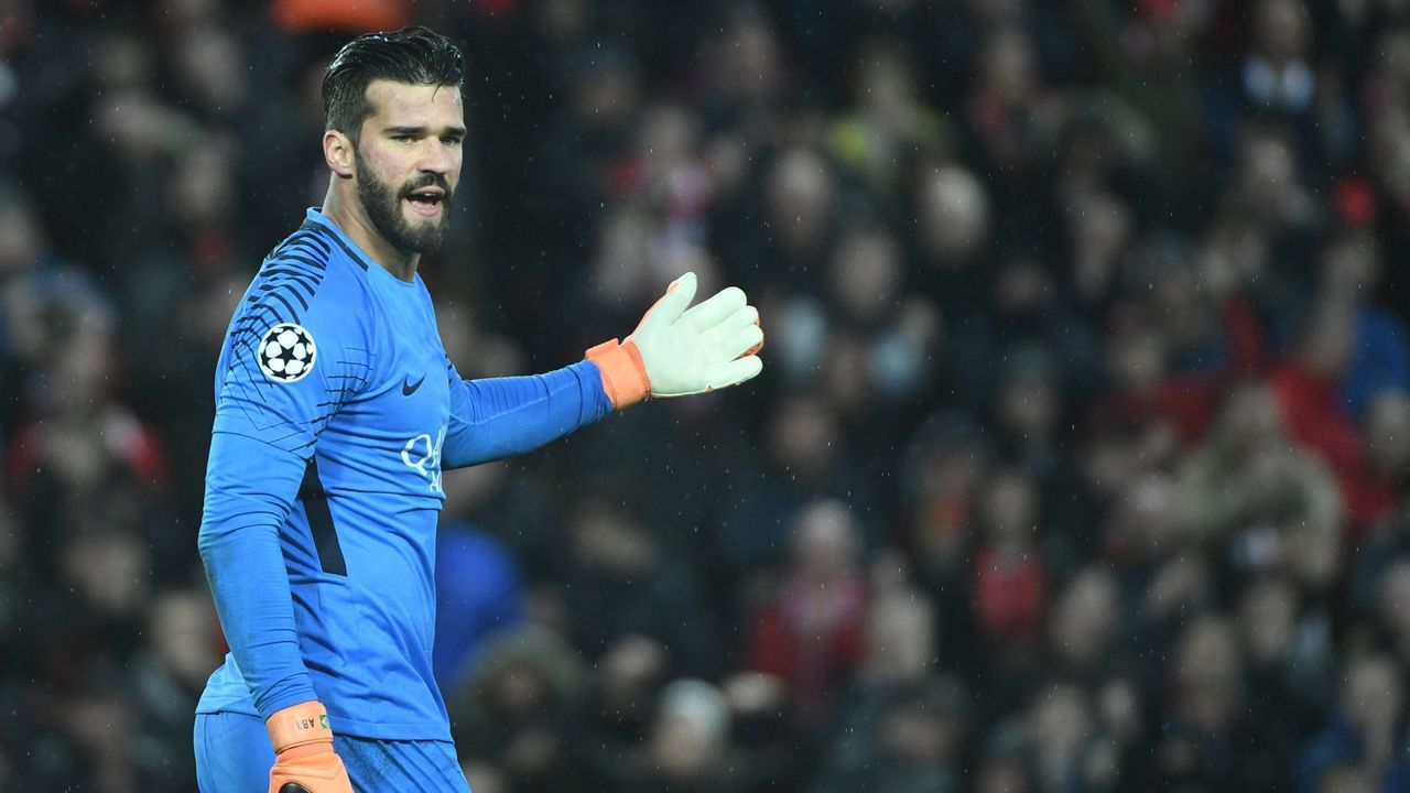 Roma's Brazilian goalkeeper Alisson gestures during the UEFA Champions League first leg semi-final football match between Liverpool and Roma at Anfield stadium in Liverpool, north west England on April 24, 2018.