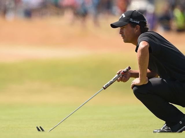 US golfer Kevin Kisner lines up a putt on the 16th green during his first round on day one of The 147th Open golf Championship at Carnoustie, Scotland on July 19, 2018.