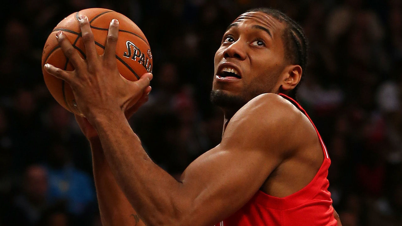 TORONTO, ON - FEBRUARY 14: Kawhi Leonard #2 of the San Antonio Spurs and the Western Conference handles the ball against John Wall #2 of the Washington Wizards and the Eastern Conference in the second half during the NBA All-Star Game 2016 at the Air Canada Centre on February 14, 2016 in Toronto, Ontario. NOTE TO USER: User expressly acknowledges and agrees that, by downloading and/or using this Photograph, user is consenting to the terms and conditions of the Getty Images License Agreement.